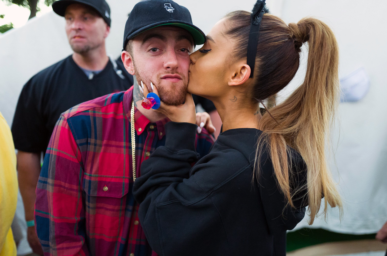 Ariana Grande Ends Performance by Kissing Mac Miller on the Stage