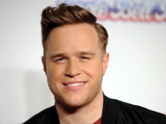 Olly Murs, a new collaboration. The artist Travi McCoy released the video for "Wrapped Up" - VIDEO